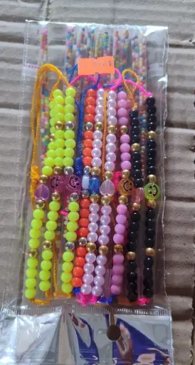 BUCHE PAVO PULSERA PERLA X 10